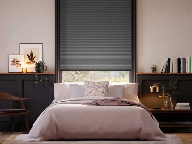 Consider a blackout blind to keep your bedroom cool and keep out the heat