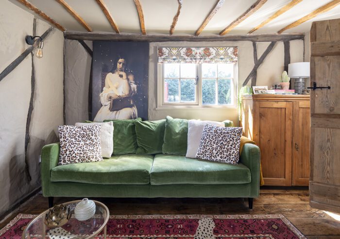 A Rockett St George print of a Victorian lady makes a statement by the window, and Kerry has added in a wooden chest of drawers and a new blind using Caspian fabric from Emma J Shipley. 