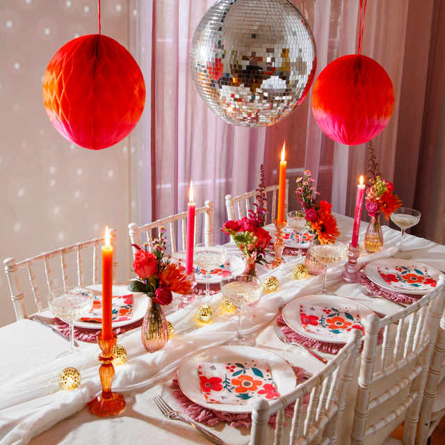 New years eve dinner party disco tablescape with red and white