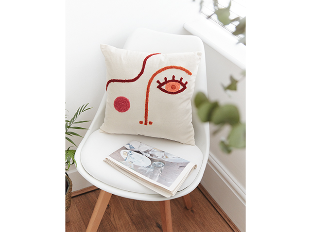 Missguided Sass belle cream tufted face cushion | Good Homes Magazine