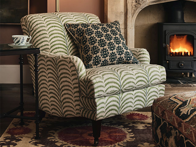 Cosy armchairs are a key look for Cotswolds cottages