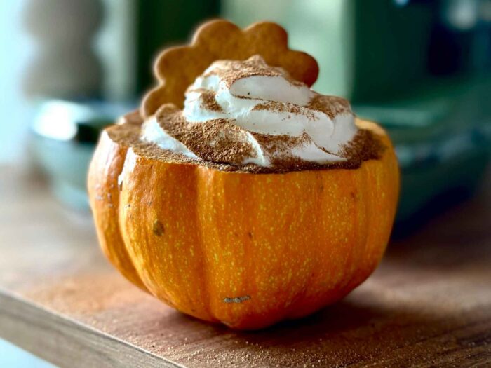 A hollowed out pumpkin makes the perfect dish for a Halloween dessert