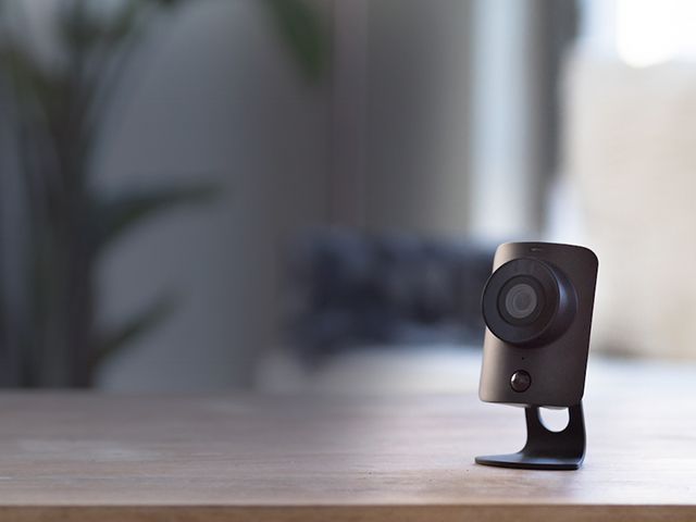 simplisafe camera copy - buyer's guide to smart security cameras - living room - goodhomesmagazine.com