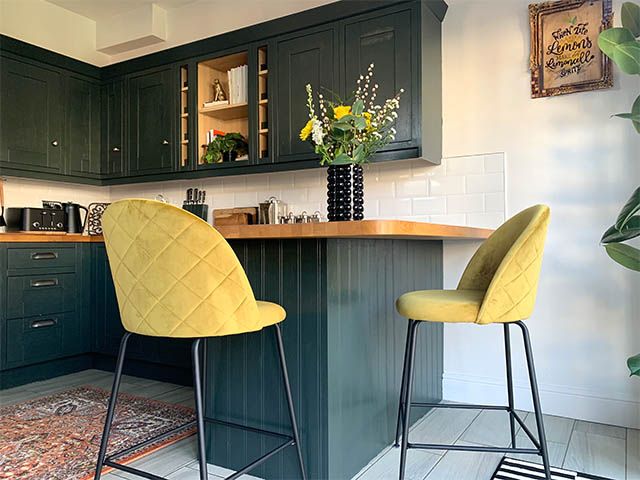 teal kitchen with yellow stools - design ideas for incorporating a breakfast bar into your kitchen