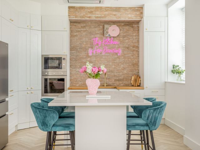 80s inspired kitchen with neon light sign