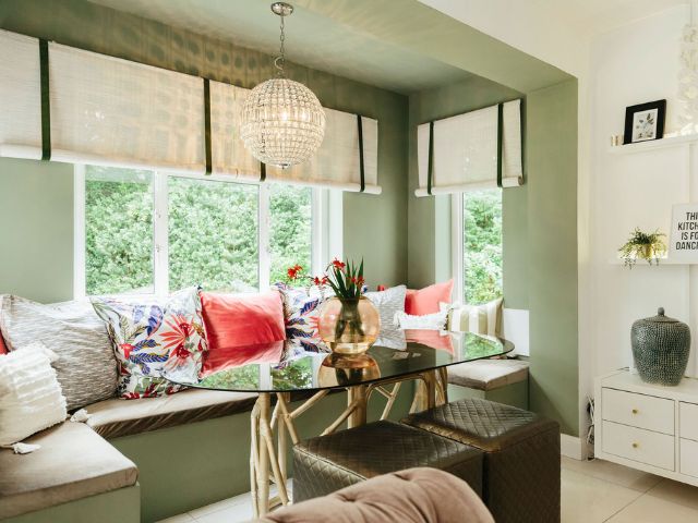 80s inspired living room with coloured cushions