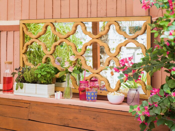 Coral fence with Moorish mirror and sideboard