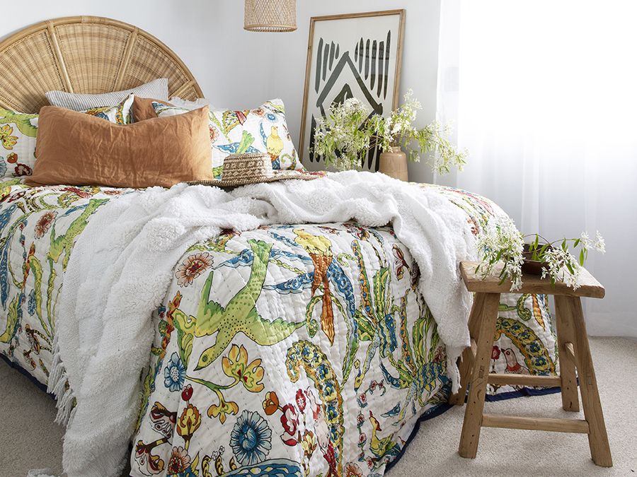 white deep teal bird print quilt - inspiration - goodhomesmagazine.com